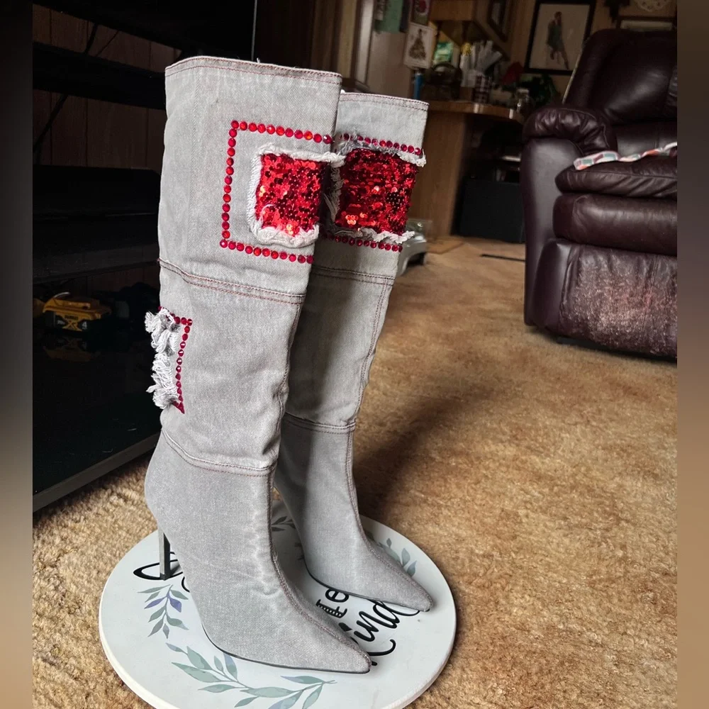 Woman’s multi-color red stone denim pointy toe knee-high boots.